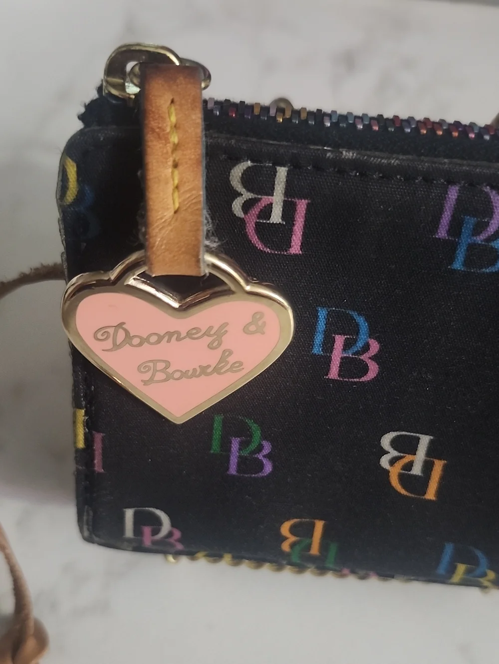 Dooney & Bourke black rainbow monogram wristlet